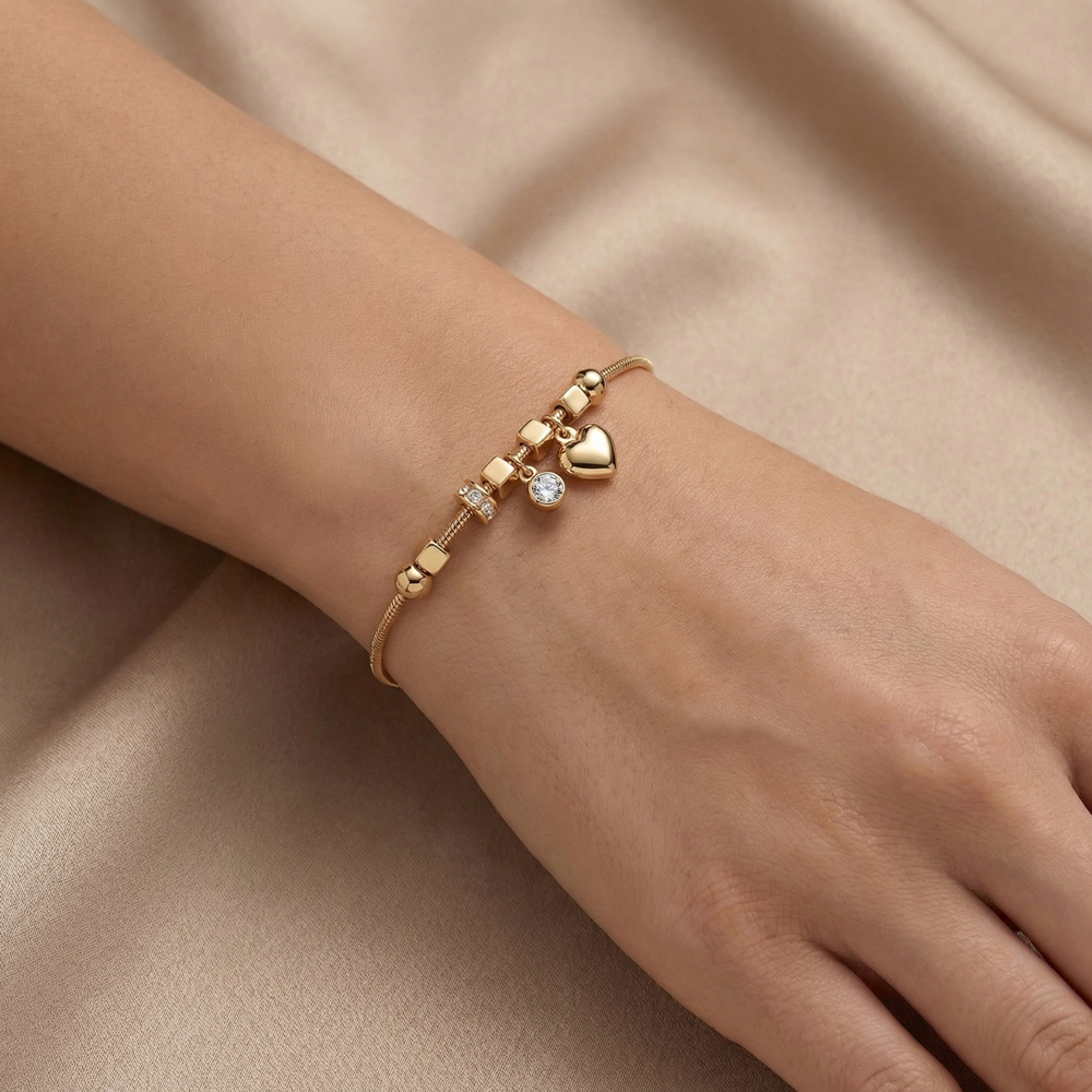 Дамска златна гривна с висящи елементи