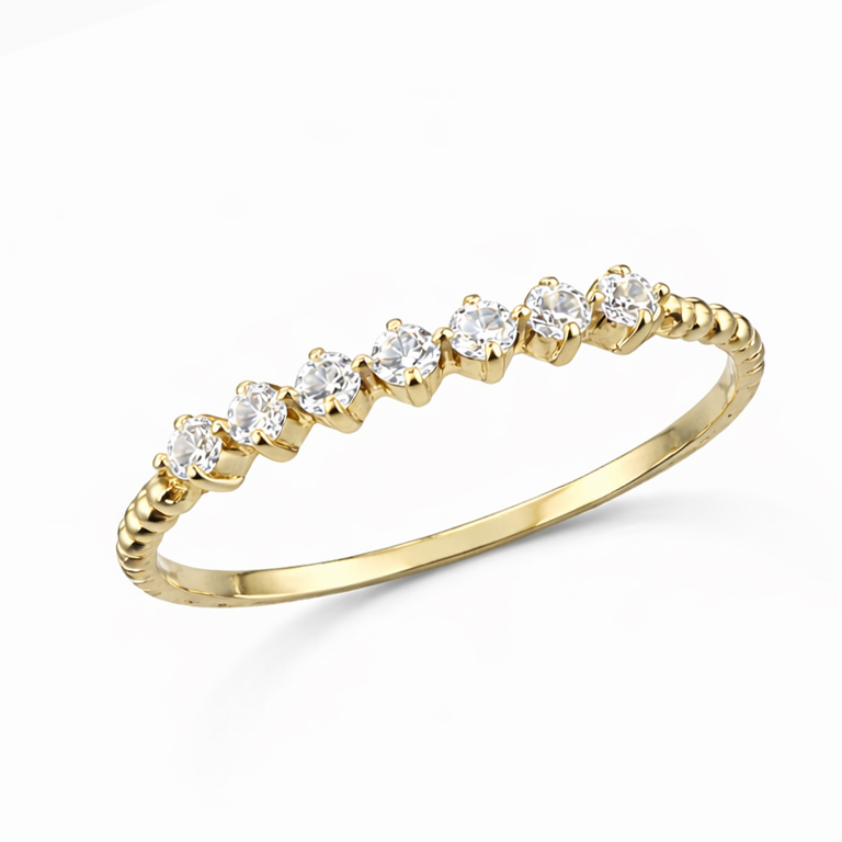 Нежен златен пръстен от жълто злато тип халка със седем камъка циркон