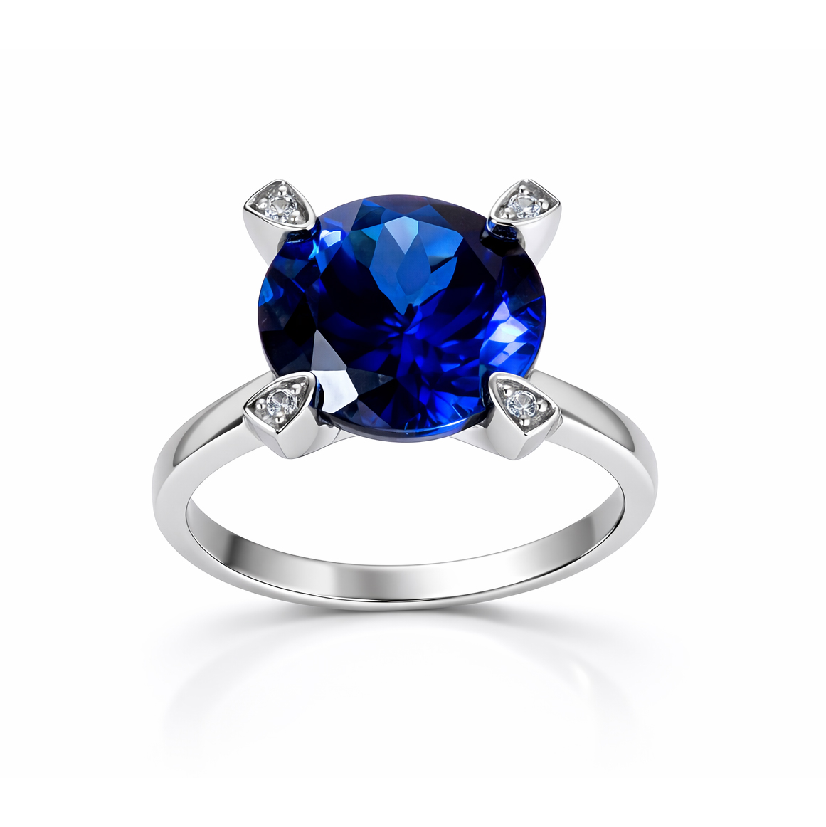 Пръстен бяло злато с голям сапфир и циркон