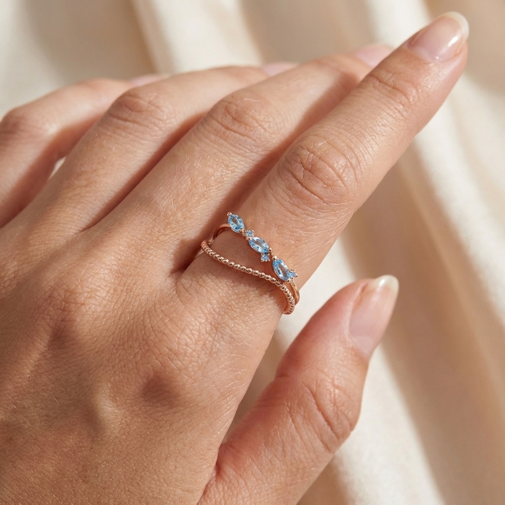 Пръстен розово злато с камъни аквамарин . нежен златен пръстен от розово злато