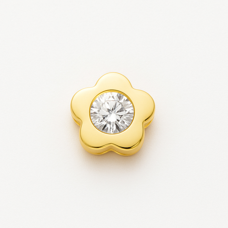 Златна висука цвете с едно камъче