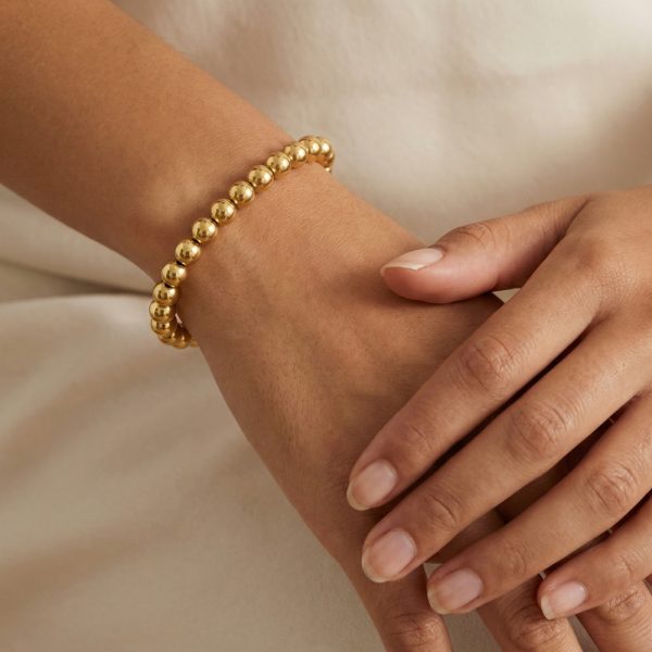 Златна гривна Golden Beads – елегантна гривна с топчета за жени